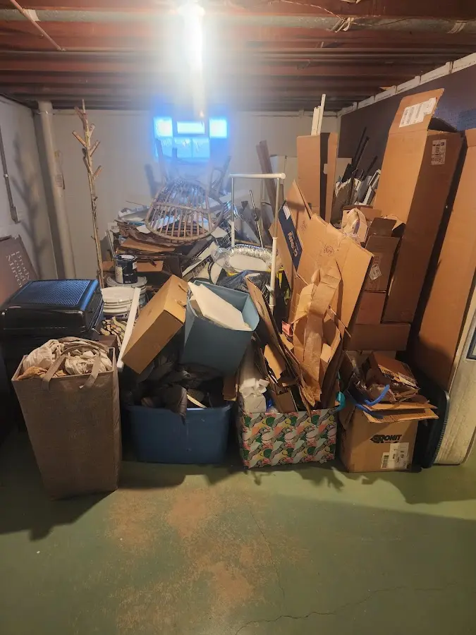 Roll-off dumpster container at job site for 20 Yard Dumpster Rental in Woonsocket